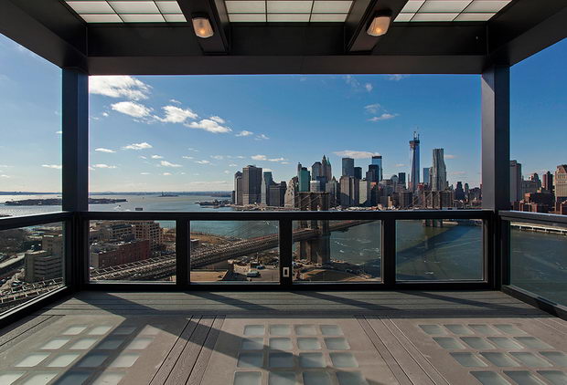 Clock-Tower-Apartment-covered-rooftop-with-views-of-New-York-CIty