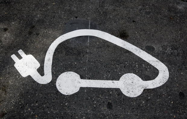 The logo of the autobleue electric car is painted on the road during the launch of the Autobleue program in Nice