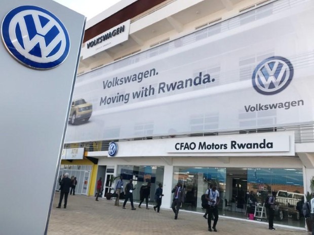 Visitors are seen outside the Volkswagen new car plant in Kigali