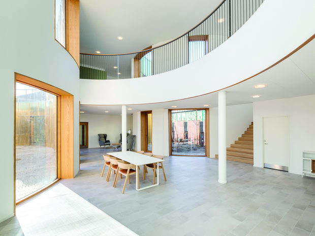 hospice-copenhagen-nord-architects-gold-cladding-curved-architecture-mark-magazine-04