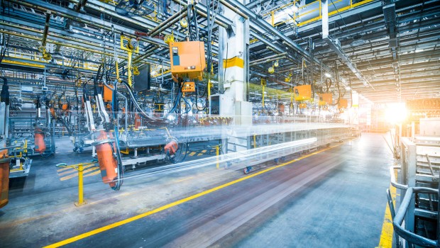 robots welding in a car factory
