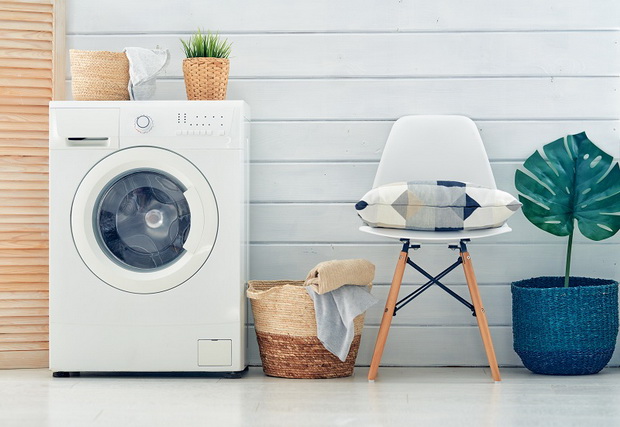 laundry room with a washing machine