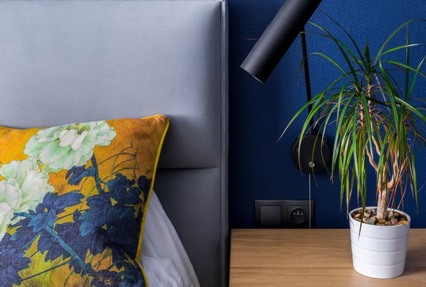 Bedroom with cobalt blue wallpaper