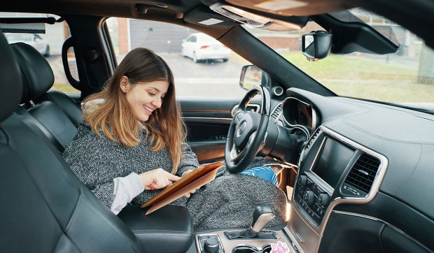 Woman enjoy her self-drive car