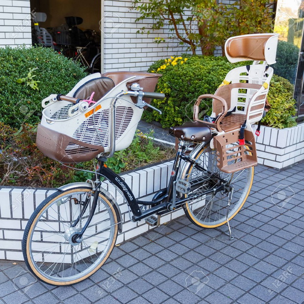Tokyo, Japan - November 23 2013: The bicycle with baby seats is
