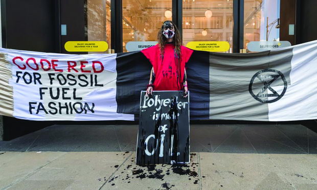 Extinction Rebellion protest against fossil-fuel fashion in London.