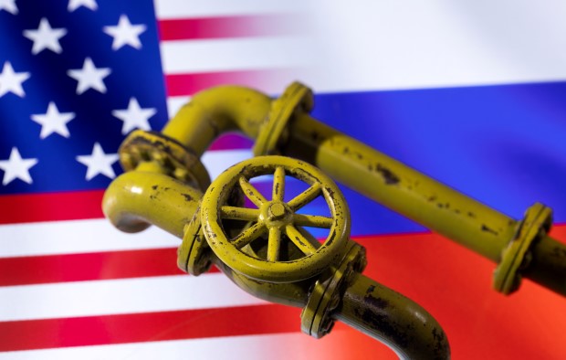 FILE PHOTO: Illustration shows Natural Gas Pipes and U.S. and Russian flags